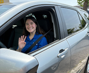 happy customer inside a car